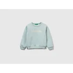 Pullover sweatshirt with glittery print